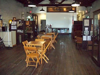 Wooden table and chairs in center of museum